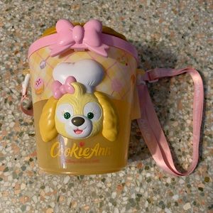 Tokyo Disneyland CookieAnn popcorn bucket with lid and shoulder strap